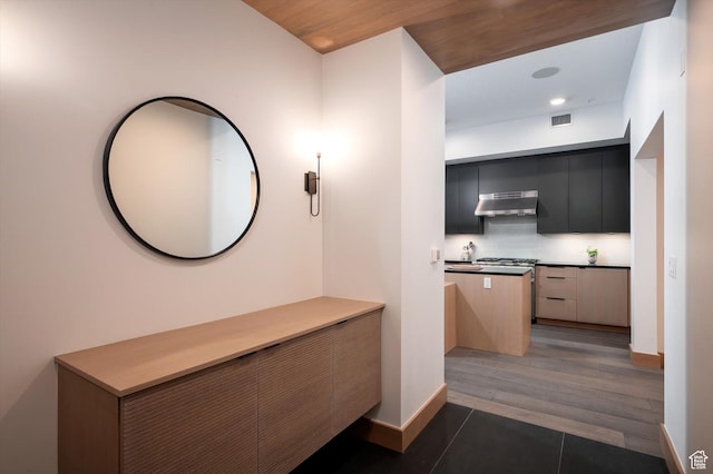 1271 Lowell Ave Unit B-103, Park City, UT 84060 - hallway with baseboards, visible vents, and light wood-style floors