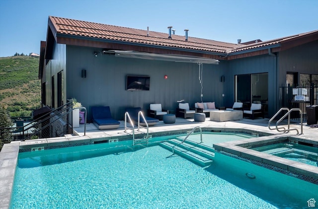 1271 Lowell Ave Unit B-103, Park City, UT 84060 - pool with an outdoor hangout area, a patio area, and a hot tub