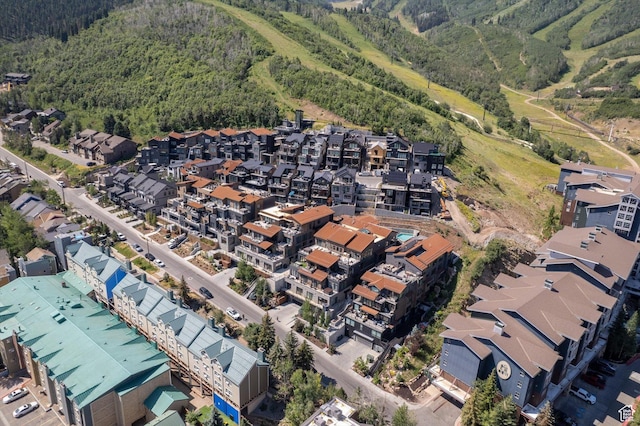 1271 Lowell Ave Unit B-103, Park City, UT 84060 - drone / aerial view featuring a residential view and a wooded view