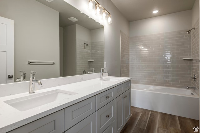 1072 S 2760 E, Spanish Fork, UT 84660 - bathroom featuring dual vanity, wood-type flooring, and tiled shower / bath