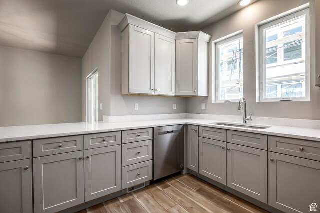 1072 S 2760 E, Spanish Fork, UT 84660 - kitchen featuring gray cabinets, light hardwood / wood-style flooring, sink, and stainless steel dishwasher