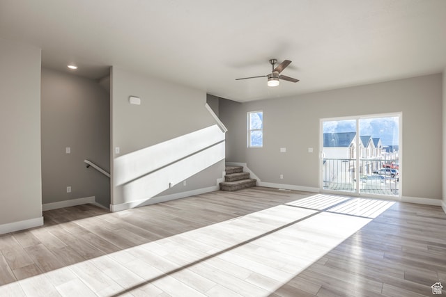 1068 S 2760 E, Spanish Fork, UT 84660 - unfurnished living room with light wood-type flooring and ceiling fan