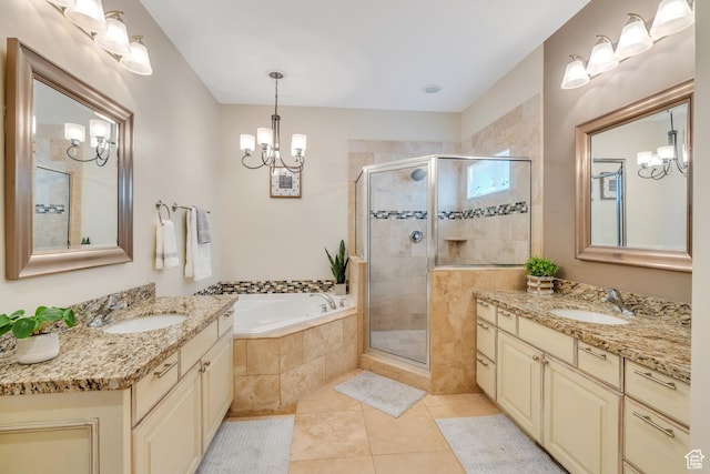 7078 N Sierra Way E, Eagle Mountain, UT 84005 - bathroom with vanity, tile patterned floors, and separate shower and tub