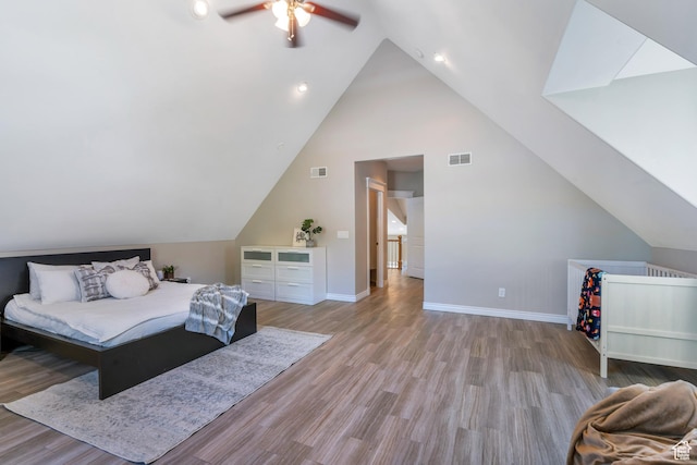 7078 N Sierra Way E, Eagle Mountain, UT 84005 - bedroom with ceiling fan, high vaulted ceiling, and light wood-type flooring