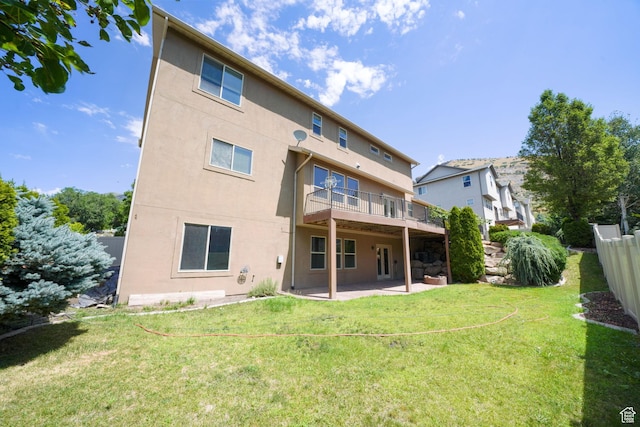 1566 E 300 S, Pleasant Grove, UT 84062 - rear view of house with a patio area, stucco siding, fence, and a lawn