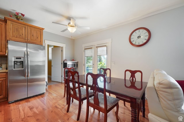 1566 E 300 S, Pleasant Grove, UT 84062 - dining room with light wood-style floors, ceiling fan, and crown molding