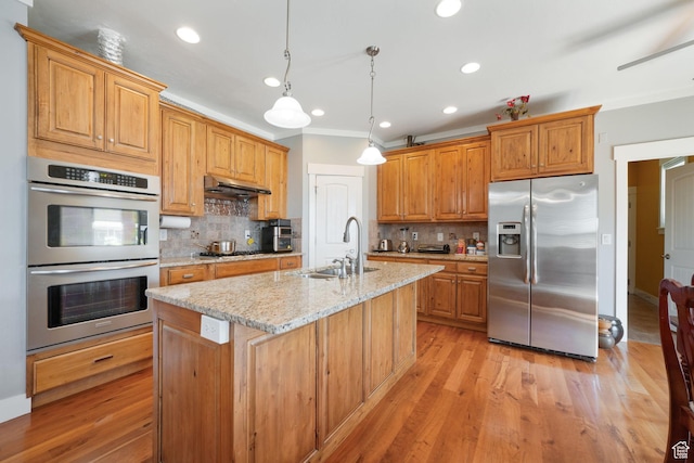 1566 E 300 S, Pleasant Grove, UT 84062 - kitchen with light wood-style floors, light stone countertops, a sink, stainless steel appliances, and a center island with sink