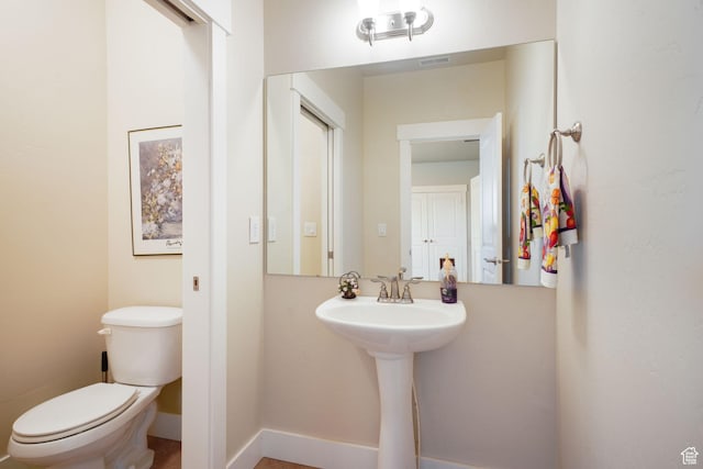 1566 E 300 S, Pleasant Grove, UT 84062 - bathroom featuring visible vents, toilet, and baseboards