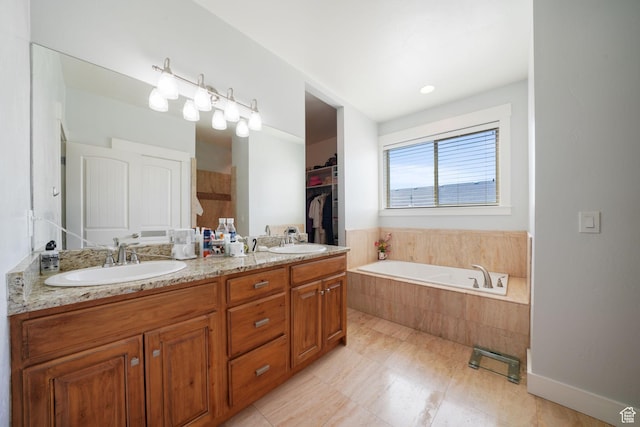 1566 E 300 S, Pleasant Grove, UT 84062 - bathroom featuring a bath, double vanity, a sink, and a walk in closet