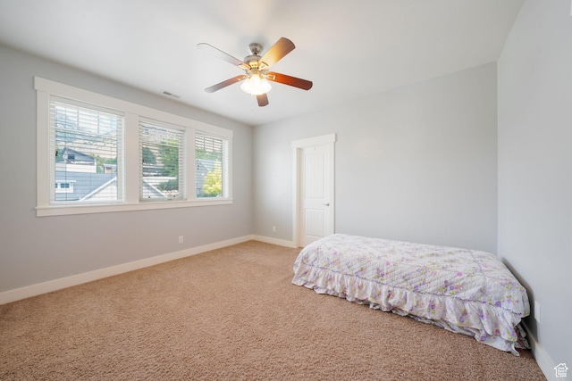 1566 E 300 S, Pleasant Grove, UT 84062 - bedroom with visible vents, baseboards, a ceiling fan, and carpet floors