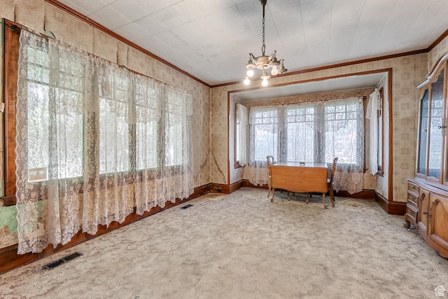 933 W Gentile St, Layton, UT 84041 - unfurnished dining area featuring visible vents, wallpapered walls, ornamental molding, carpet flooring, and a chandelier