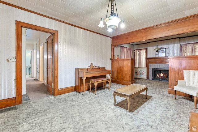 933 W Gentile St, Layton, UT 84041 - living area featuring carpet, a tile fireplace, crown molding, and wallpapered walls