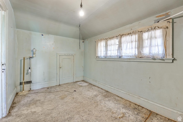 933 W Gentile St, Layton, UT 84041 - spare room featuring lofted ceiling