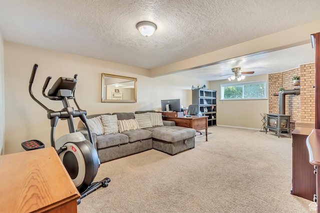 751 W 3500 N, Pleasant View, UT 84414 - carpeted living room featuring ceiling fan, a textured ceiling, and a wood stove