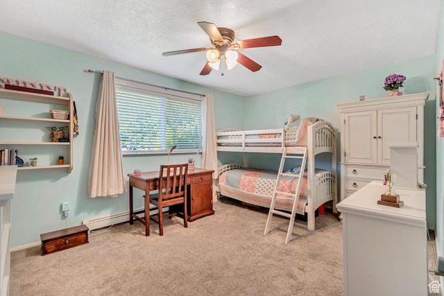 751 W 3500 N, Pleasant View, UT 84414 - bedroom featuring ceiling fan, light colored carpet, a textured ceiling, and baseboard heating