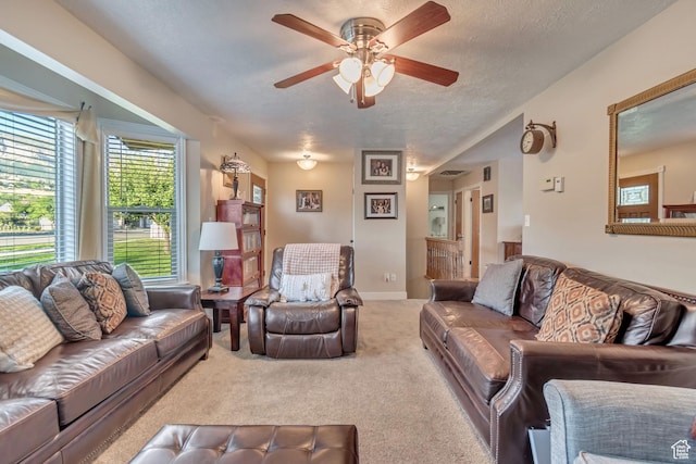 751 W 3500 N, Pleasant View, UT 84414 - carpeted living room featuring ceiling fan and a textured ceiling