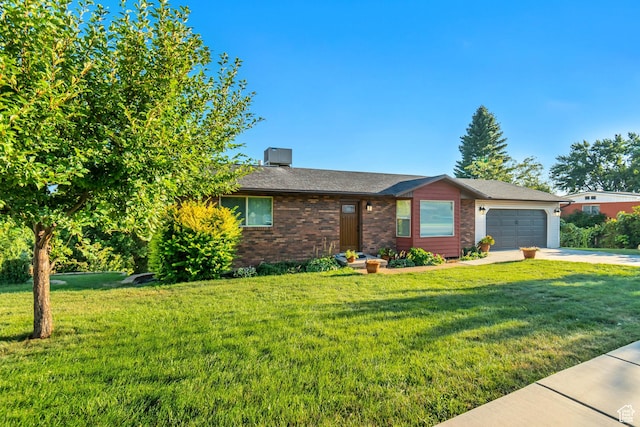 751 W 3500 N, Pleasant View, UT 84414 - single story home featuring a garage and a front lawn