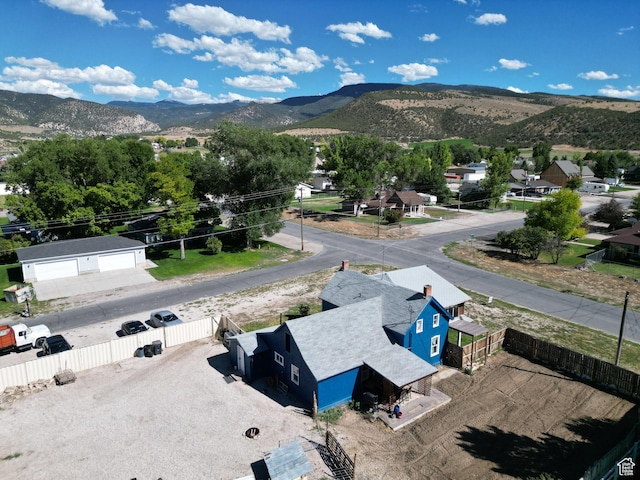 drone / aerial view featuring a mountain view