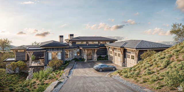 1771 N Chimney Rock Rd Unit 521, Heber City, UT 84032 - view of front facade with stone siding and asphalt driveway