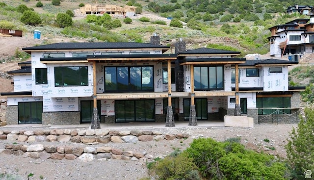 1771 N Chimney Rock Rd Unit 521, Heber City, UT 84032 - back of house with stone siding