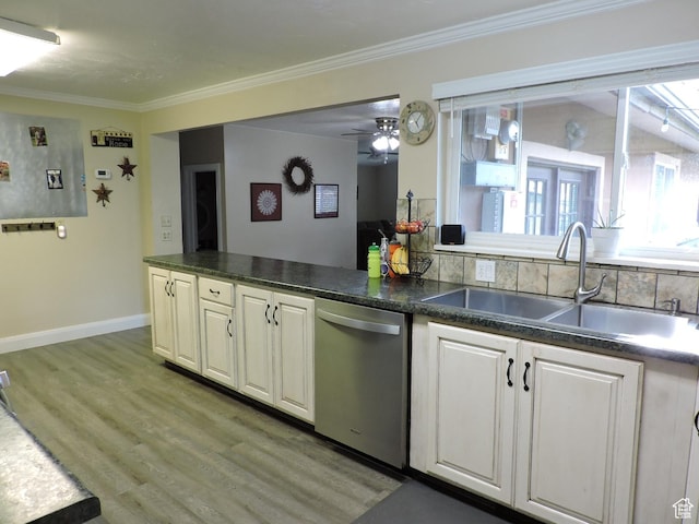 325 N 100 W, Delta, UT 84624 - kitchen with a sink, ornamental molding, light wood-style floors, and stainless steel dishwasher