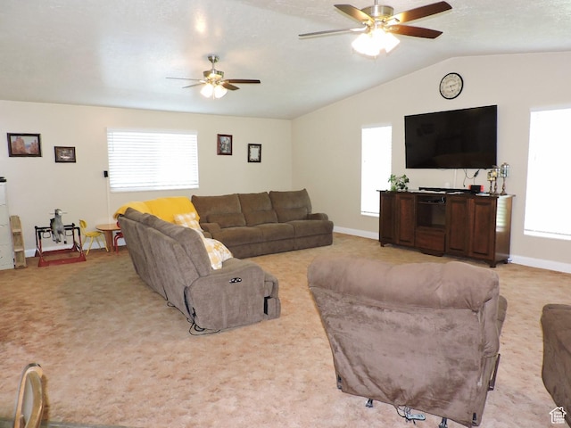 325 N 100 W, Delta, UT 84624 - living room featuring light carpet, baseboards, vaulted ceiling, and ceiling fan