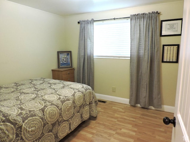 325 N 100 W, Delta, UT 84624 - bedroom featuring visible vents, baseboards, and light wood-type flooring