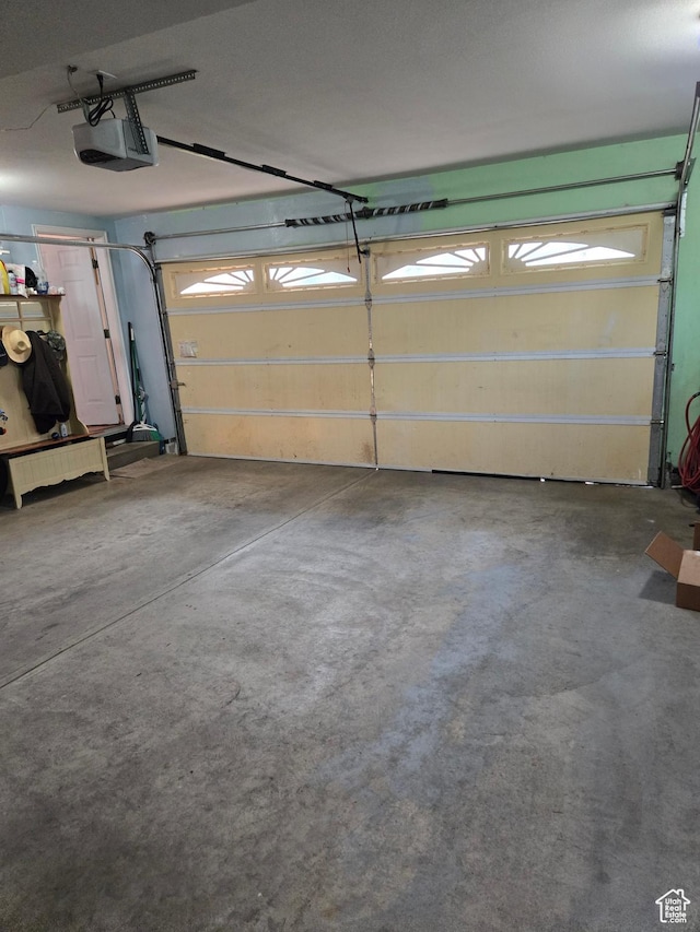 136 S 200 W, Wellsville, UT 84339 - garage featuring a garage door opener
