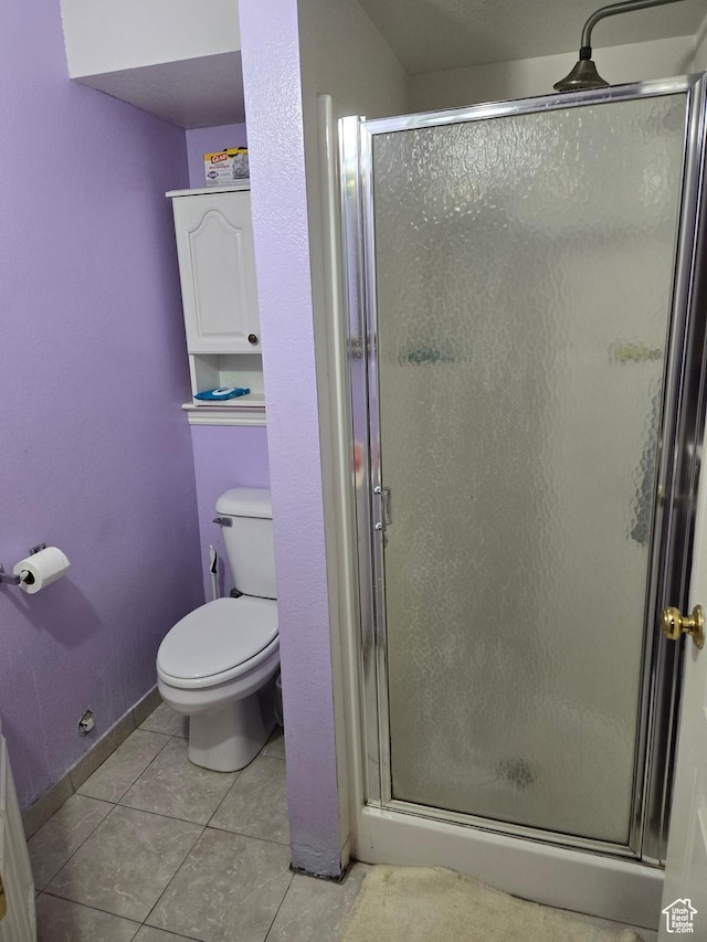 136 S 200 W, Wellsville, UT 84339 - full bathroom with toilet, a stall shower, and tile patterned floors
