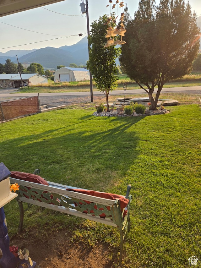 136 S 200 W, Wellsville, UT 84339 - view of property's community featuring a mountain view and a lawn