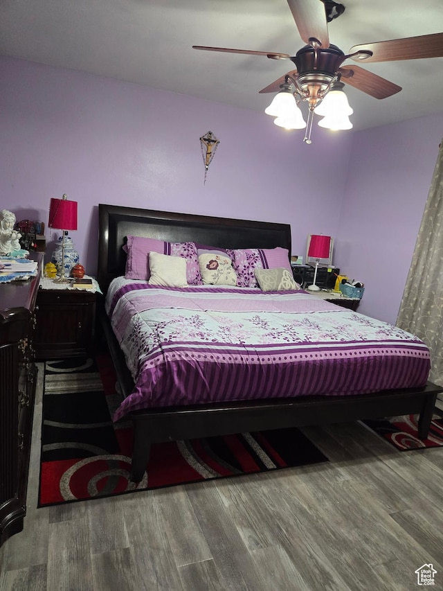 136 S 200 W, Wellsville, UT 84339 - bedroom featuring wood finished floors and ceiling fan