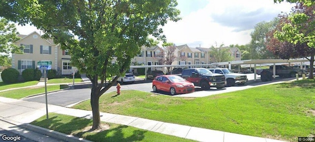 1279 W Culloden Ct, Murray, UT 84123 - partially covered parking lot with a residential view
