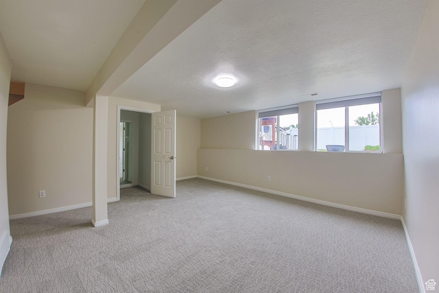 1279 W Culloden Ct, Murray, UT 84123 - basement featuring carpet, a textured ceiling, and baseboards