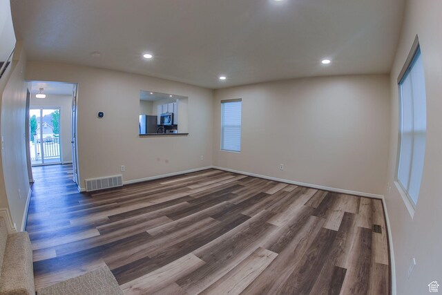 1279 W Culloden Ct, Murray, UT 84123 - unfurnished room featuring recessed lighting, visible vents, baseboards, and wood finished floors