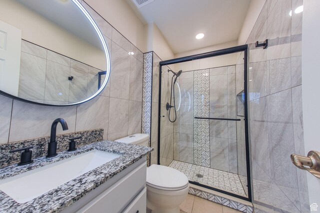 1279 W Culloden Ct, Murray, UT 84123 - bathroom with toilet, a stall shower, tile walls, and vanity