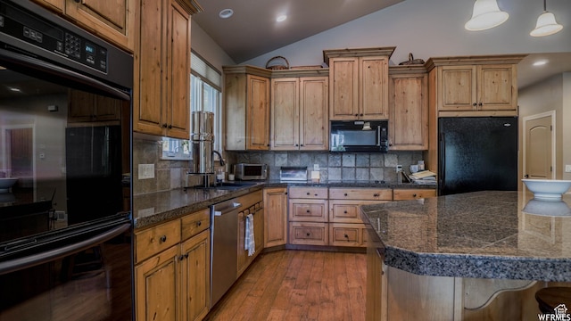 1336 Antibe Ln, Midway, UT 84049 - kitchen with lofted ceiling, tasteful backsplash, pendant lighting, light hardwood / wood-style floors, and black appliances