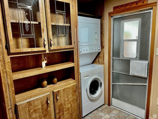 1150 W Red Hills Pkwy # 1, Washington, UT 84780 - clothes washing area with stacked washer and dryer and laundry area