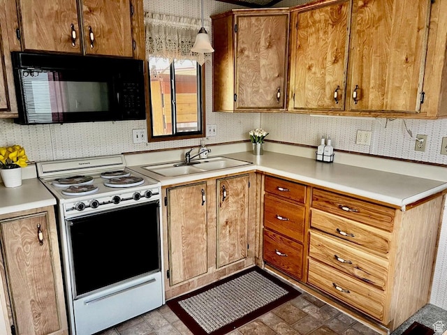 1150 W Red Hills Pkwy # 1, Washington, UT 84780 - kitchen featuring black microwave, white range with electric cooktop, light countertops, and a sink