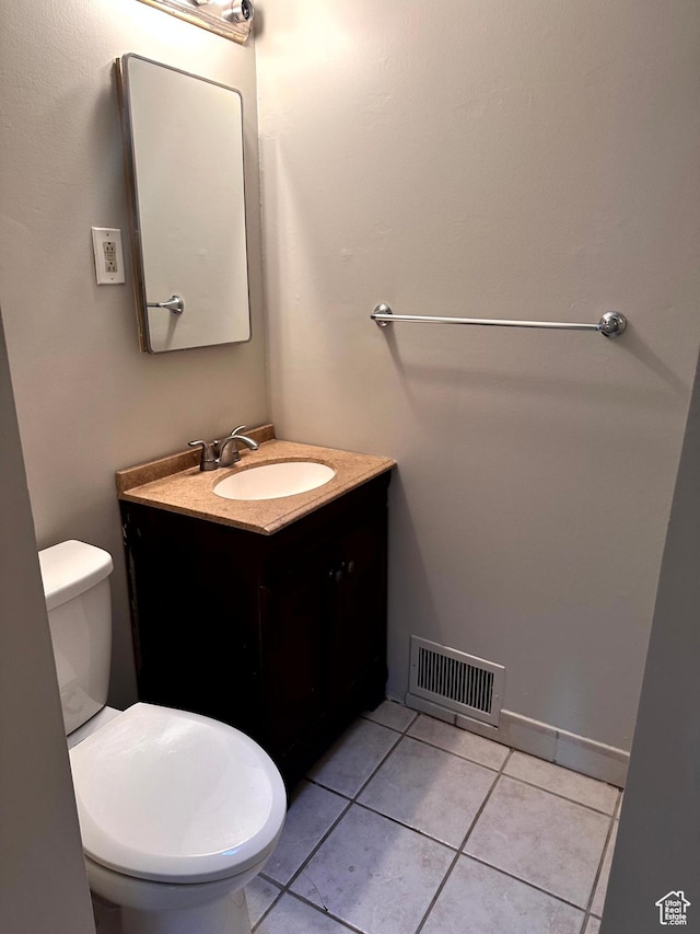 3164 W Mark Ave S, West Valley City, UT 84119 - bathroom with toilet, tile patterned floors, vanity, and visible vents