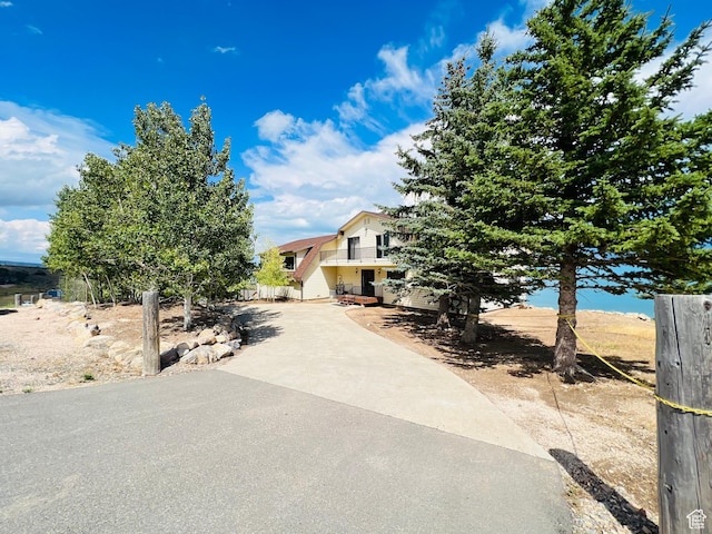 588 W Raspberry Patch Rd, Garden City, UT 84028 - view of front of home featuring a balcony