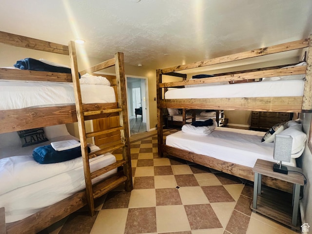588 W Raspberry Patch Rd, Garden City, UT 84028 - bedroom with tile patterned floors