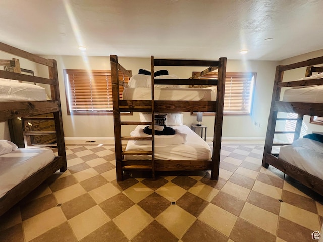 588 W Raspberry Patch Rd, Garden City, UT 84028 - bedroom with light floors and baseboards