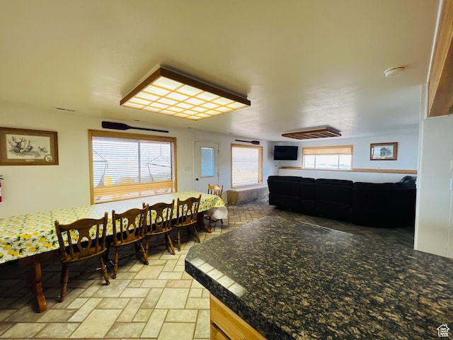 588 W Raspberry Patch Rd, Garden City, UT 84028 - dining space featuring stone finish floor