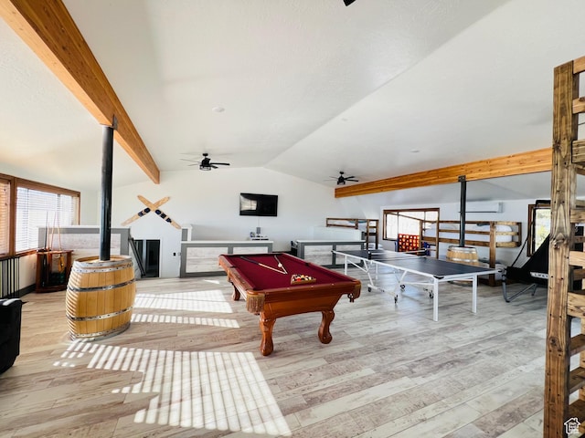 588 W Raspberry Patch Rd, Garden City, UT 84028 - recreation room with a healthy amount of sunlight, lofted ceiling with beams, a ceiling fan, and wood finished floors