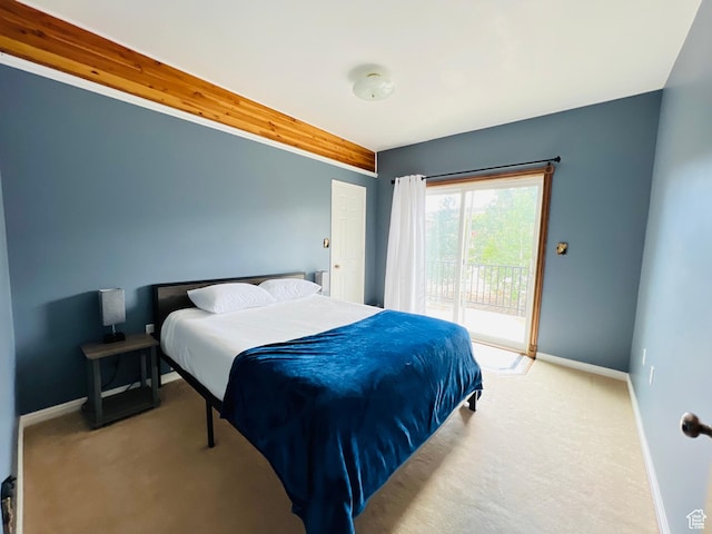588 W Raspberry Patch Rd, Garden City, UT 84028 - carpeted bedroom with baseboards and access to outside