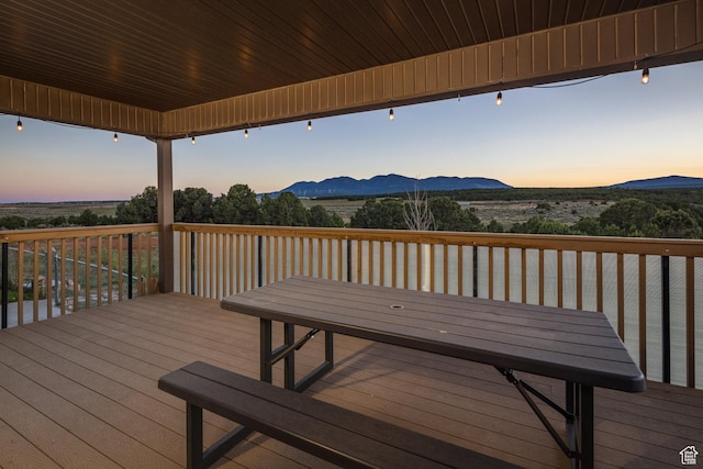 wooden terrace featuring a mountain view