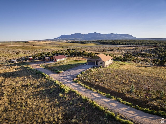 mountain view featuring a rural view