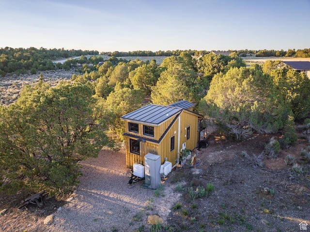 drone / aerial view with a forest view