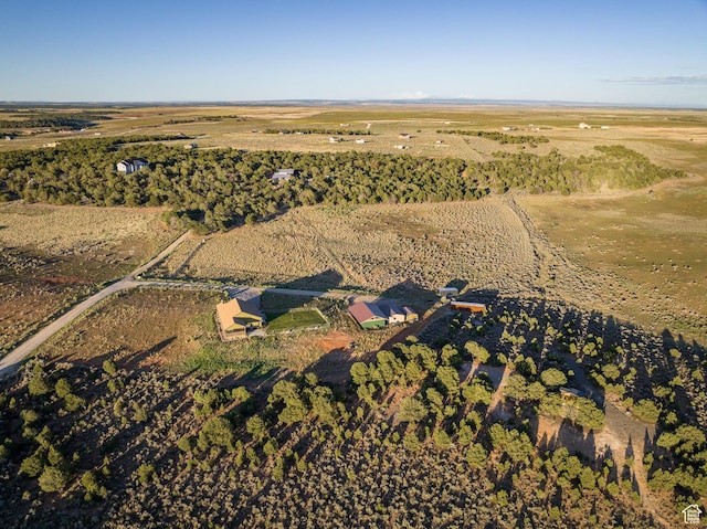 birds eye view of property with a rural view