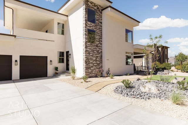 445 N 250 E, La Verkin, UT 84745 - view of front of home featuring stucco siding, an attached garage, and driveway